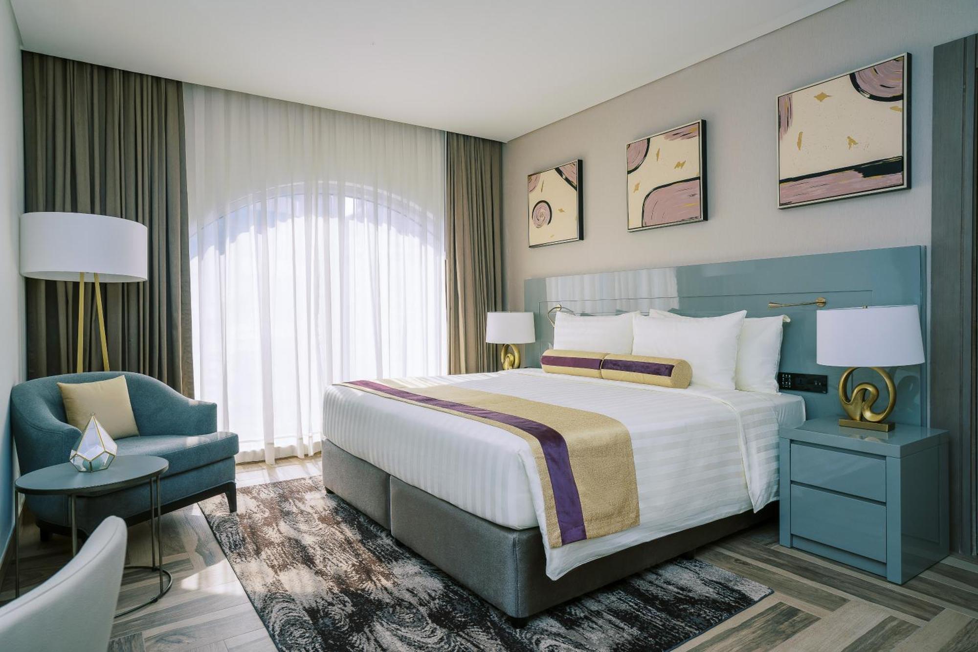 Khalidia Palace Hotel Dubai By Mourouj Gloria Esterno foto A bedroom at the hotel