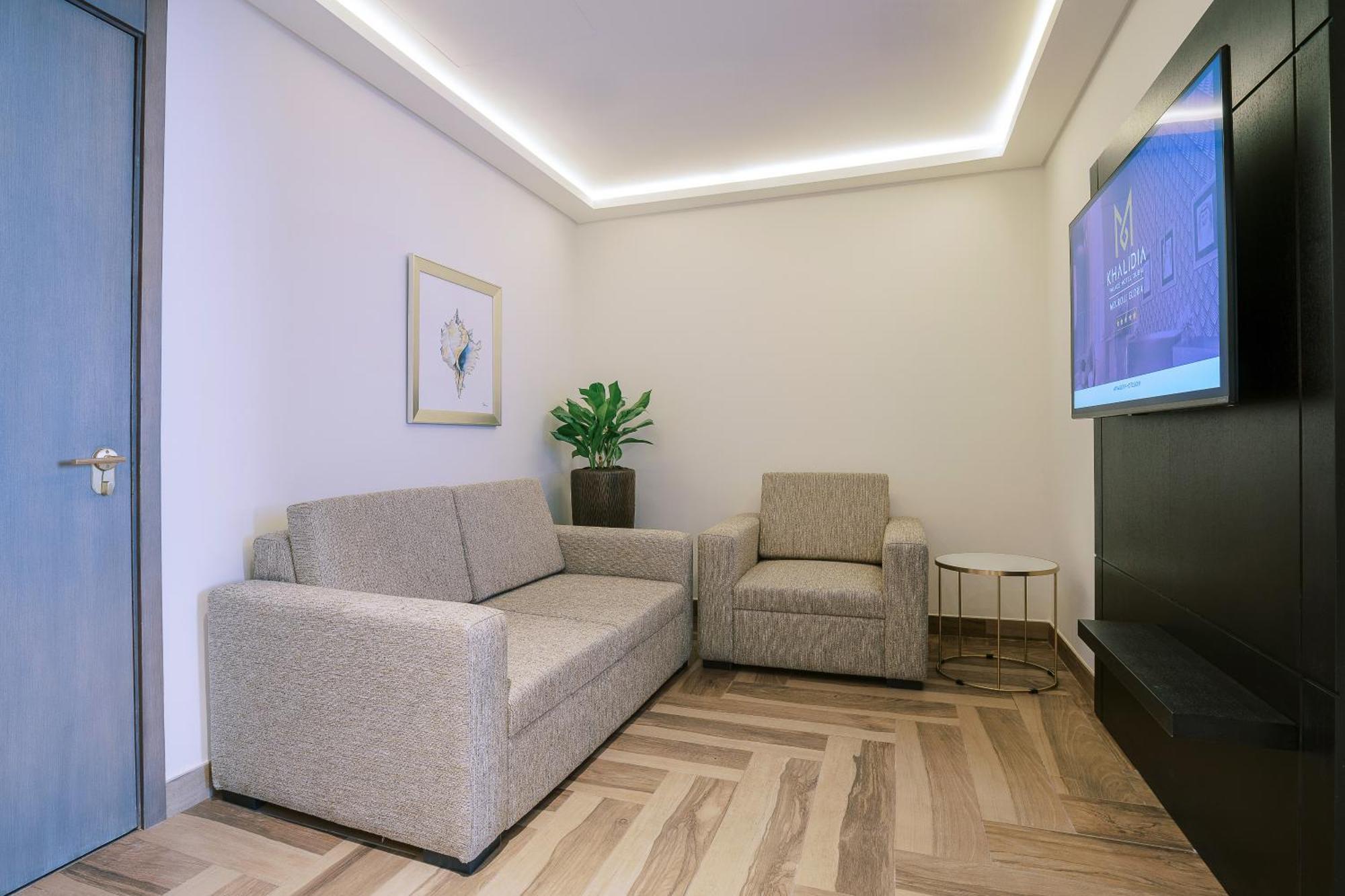 Khalidia Palace Hotel Dubai By Mourouj Gloria Esterno foto A 3D rendering of a living room